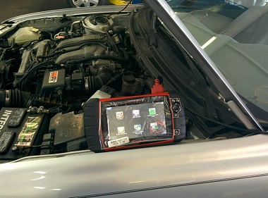 closeup of the electrical diagnostic screen turned on and connected to a car